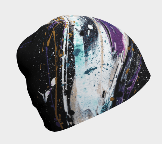 La tuque Abracadabra arbore un design abstrait éclaboussé de violet, blanc et or sur fond noir.