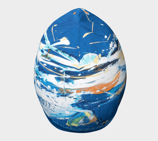 Vue de face de la tuque abstraite bleue, affichant sa couronne arrondie et son design coloré.