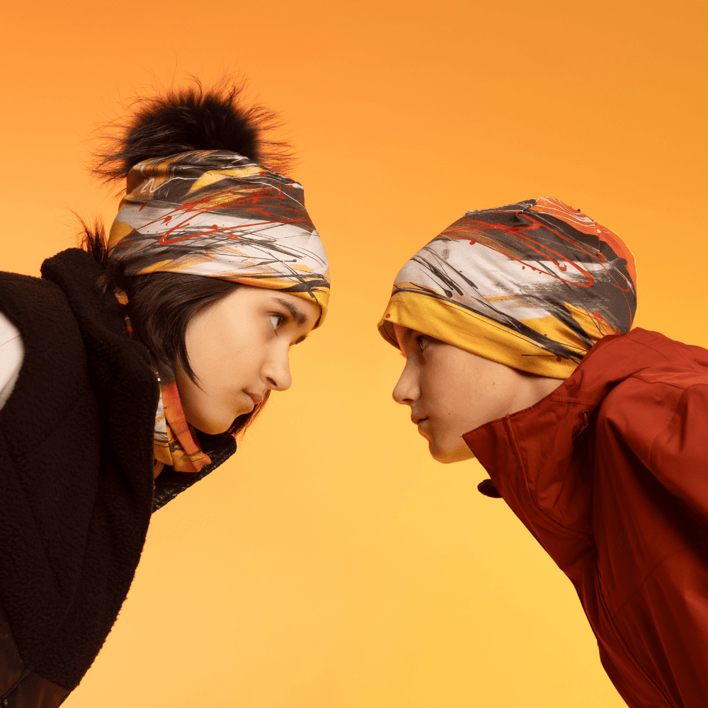 Deux enfants portent des tuques Le Coeur, l&