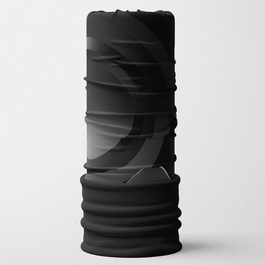 Black and grey abstract print multifunctional neck tube with a black fleece edge.