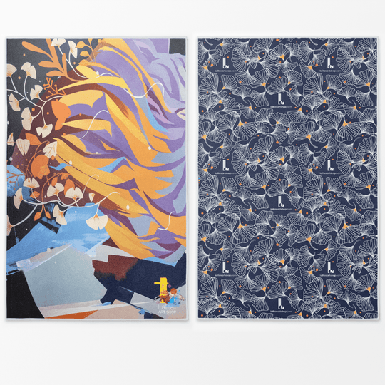 Two sides of the Spring Reversible Microfiber Premium Towel, one with abstract floral art, the other with a ginkgo leaf pattern.