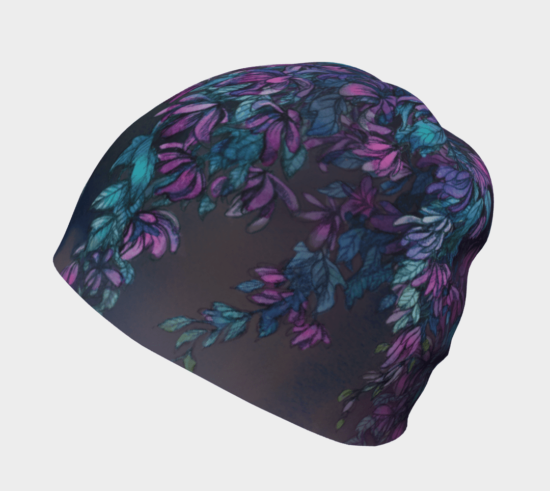 Une tuque Wisteria foncée avec un motif floral violet et turquoise vue de côté.