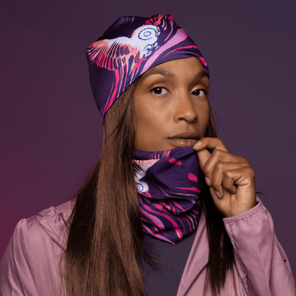 Sportive woman wearing the Magenta and Purple Owl Fleece tube and assorted beanie by Julie Rocheleau for Lalita&